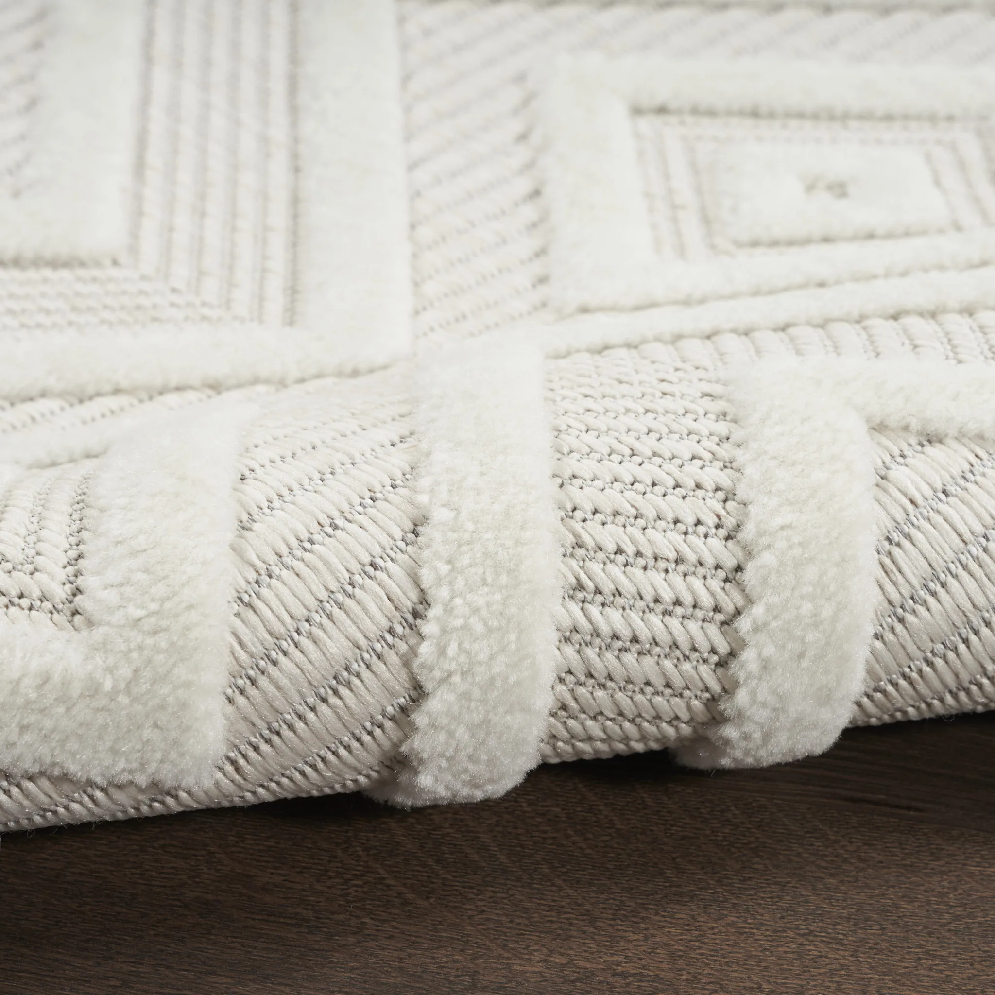 7' X 10' Ivory and White Indoor/Outdoor Area Rug - Image 5